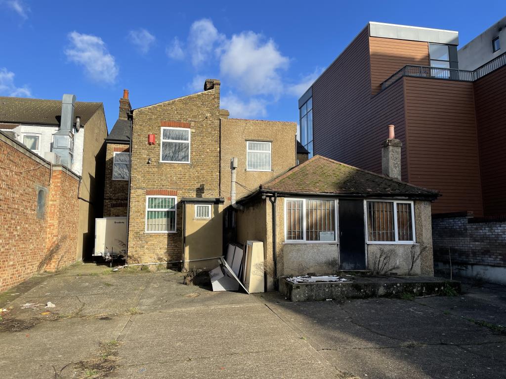 Lot: 9 - MIXED USE FREEHOLD REDEVELOPMENT OPPORTUNITY WITH PLANNING APPROVAL - Rear of existing building for redevelopment and yard